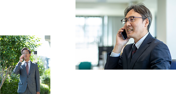 電話をする社員